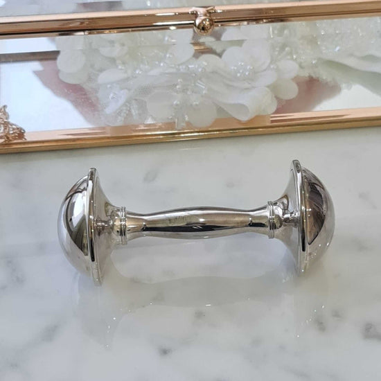 silver baby rattle