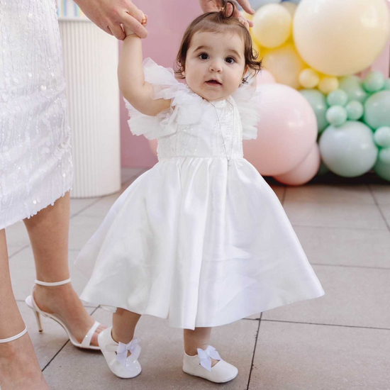 white christening shoes