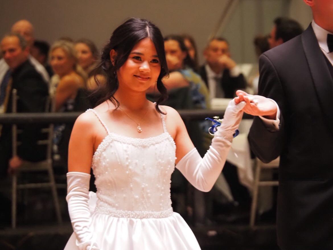 debutante dress featuring a pearl embellished corset bodice,
