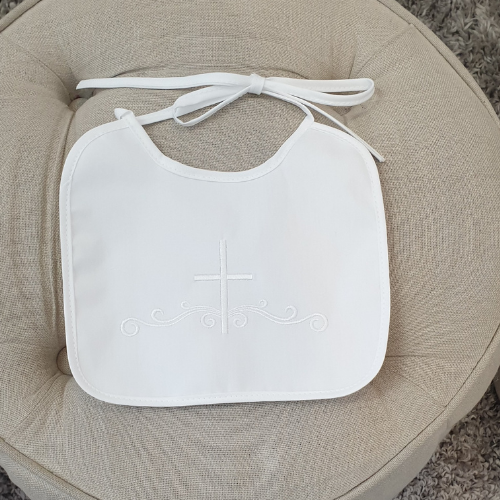 White satin christening bib with embroidered cross