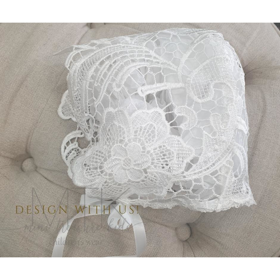 Ivory lace christening bonnet with satin ribbon