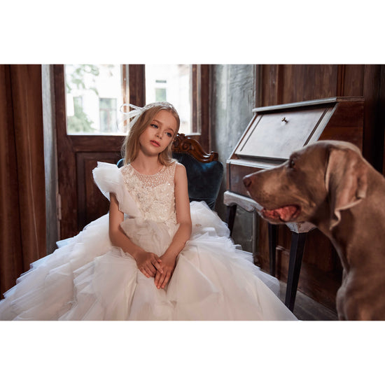 Girl wear lux communion dress
