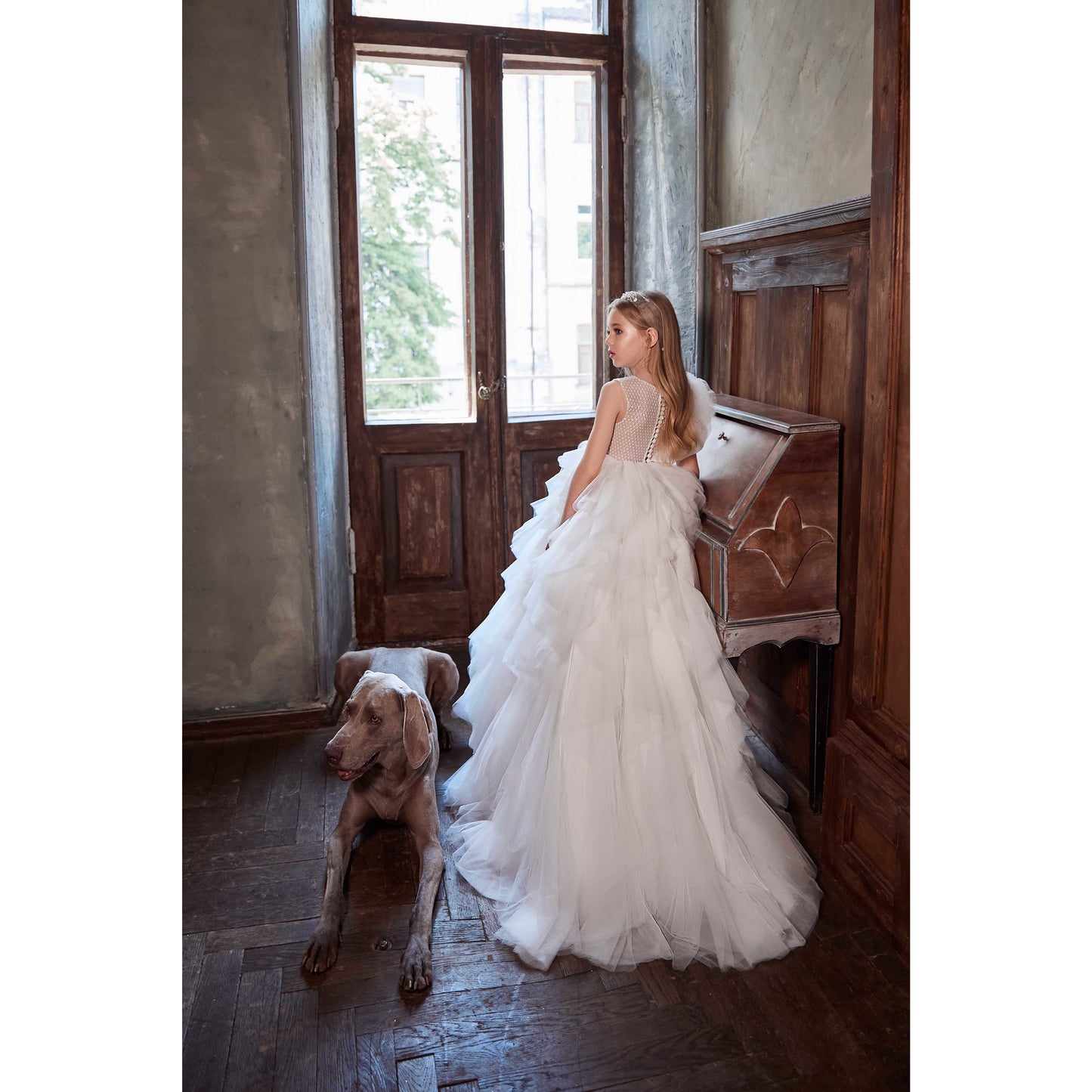 holy communion girl wearing a custom made dress