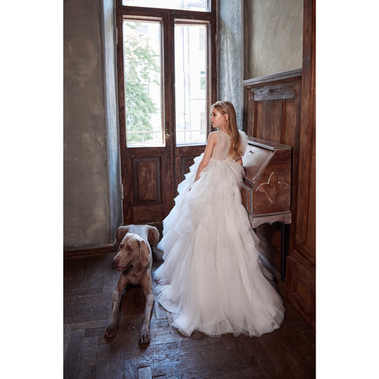 holy communion girl wearing a custom made dress