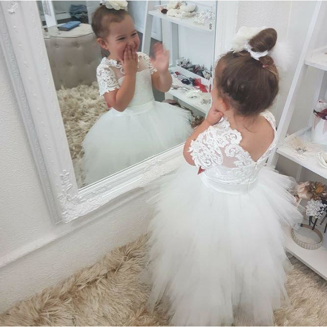 lace flower girl dresses australia Field of Wildflowers Dress This dreamy dress is everything you've been searching for! With delicate floral lace, soft puff sleeves, and a tutu-style skirt that twirls with every step, it's the perfect